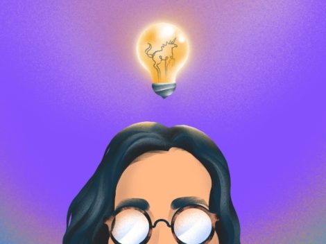 Illustration of woman's head with a unicorn lightbulb "Idea."