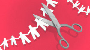 Tech layoffs: Illustration of scissors cutting a paper people chain.