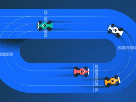 Image of racing cars on a track marked with sequential series funding goals. [Dom Guzman]